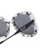 Prada Eyewear marble-effect oversized sunglasses