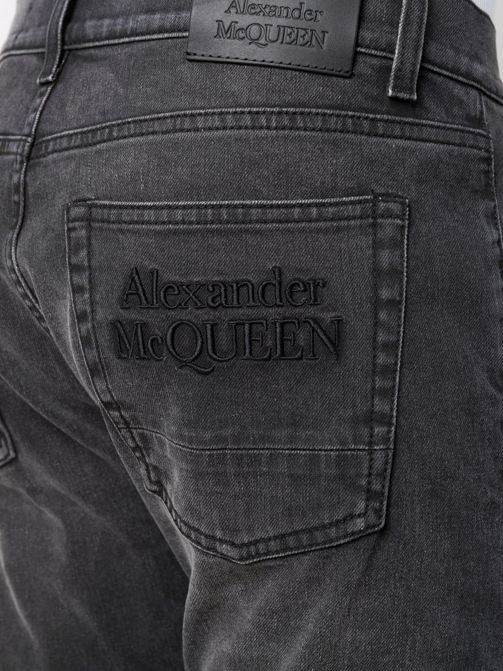 Shop Alexander Mcqueen Skinny-cut Denim Jeans In Black