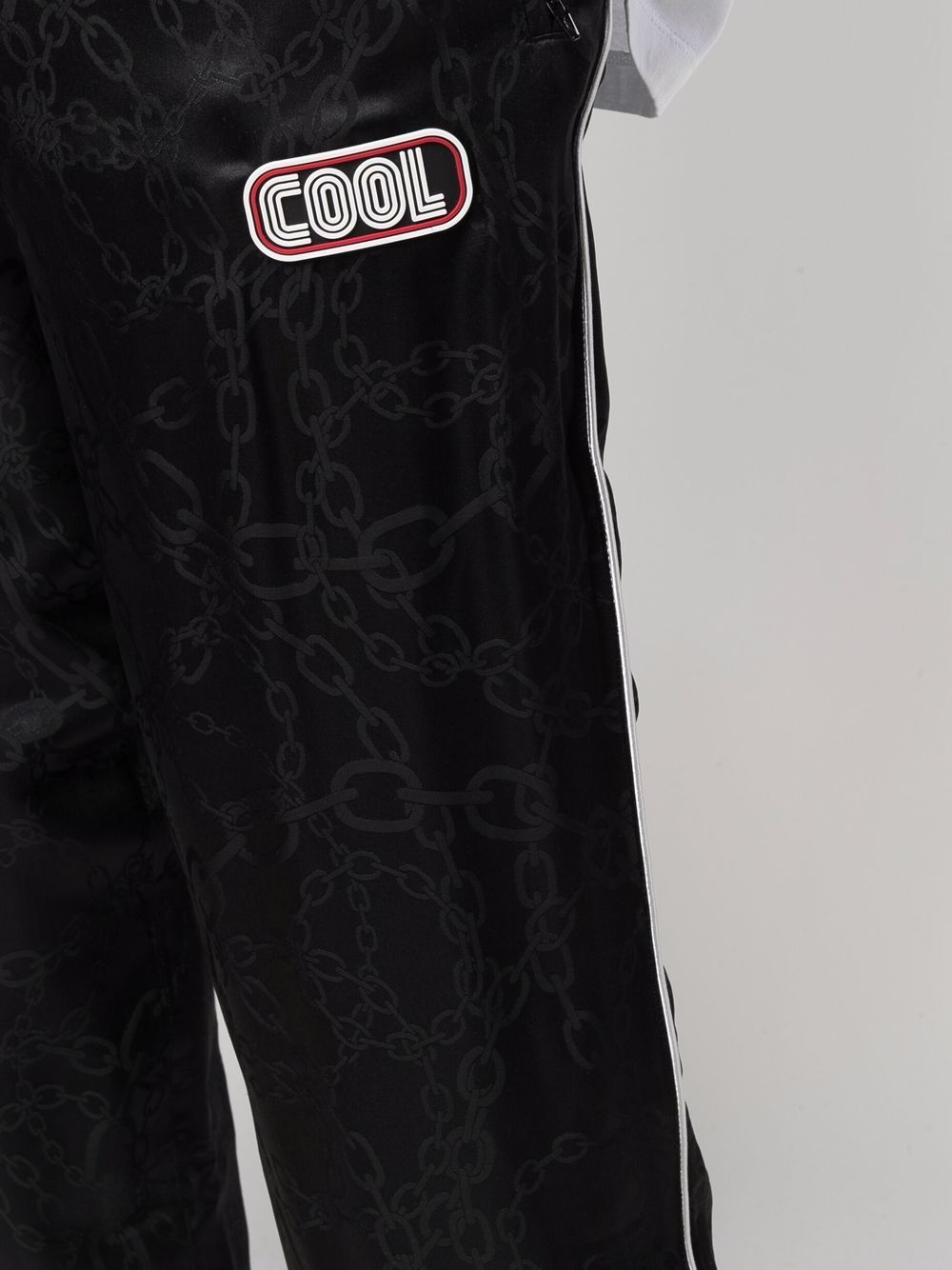 Shop Cool Tm Chain-print Slip-on Track Trousers In Black