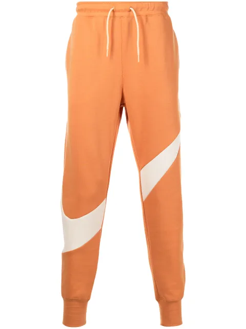 Nike swoosh-print fleece track pants