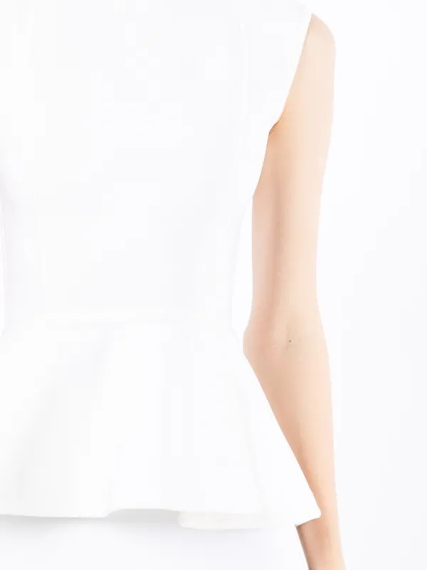 white sleeveless peplum top