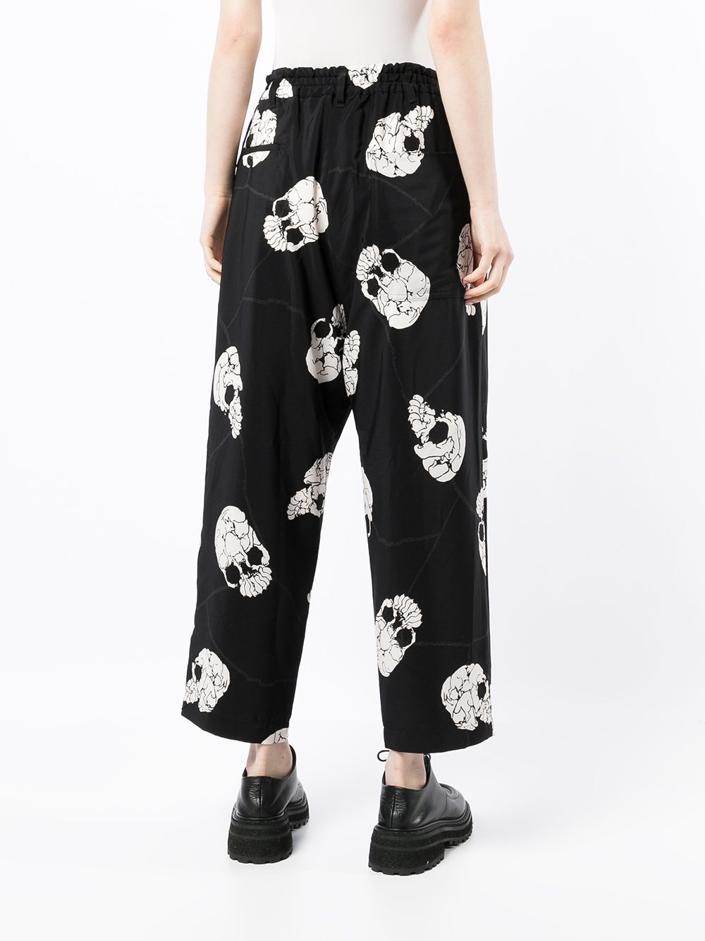 Shop Y's Skull-print Tapered Trousers In Black