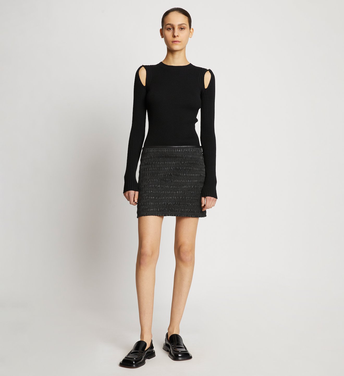 Faux Leather Smocked Mini Skirt in black | Proenza Schouler