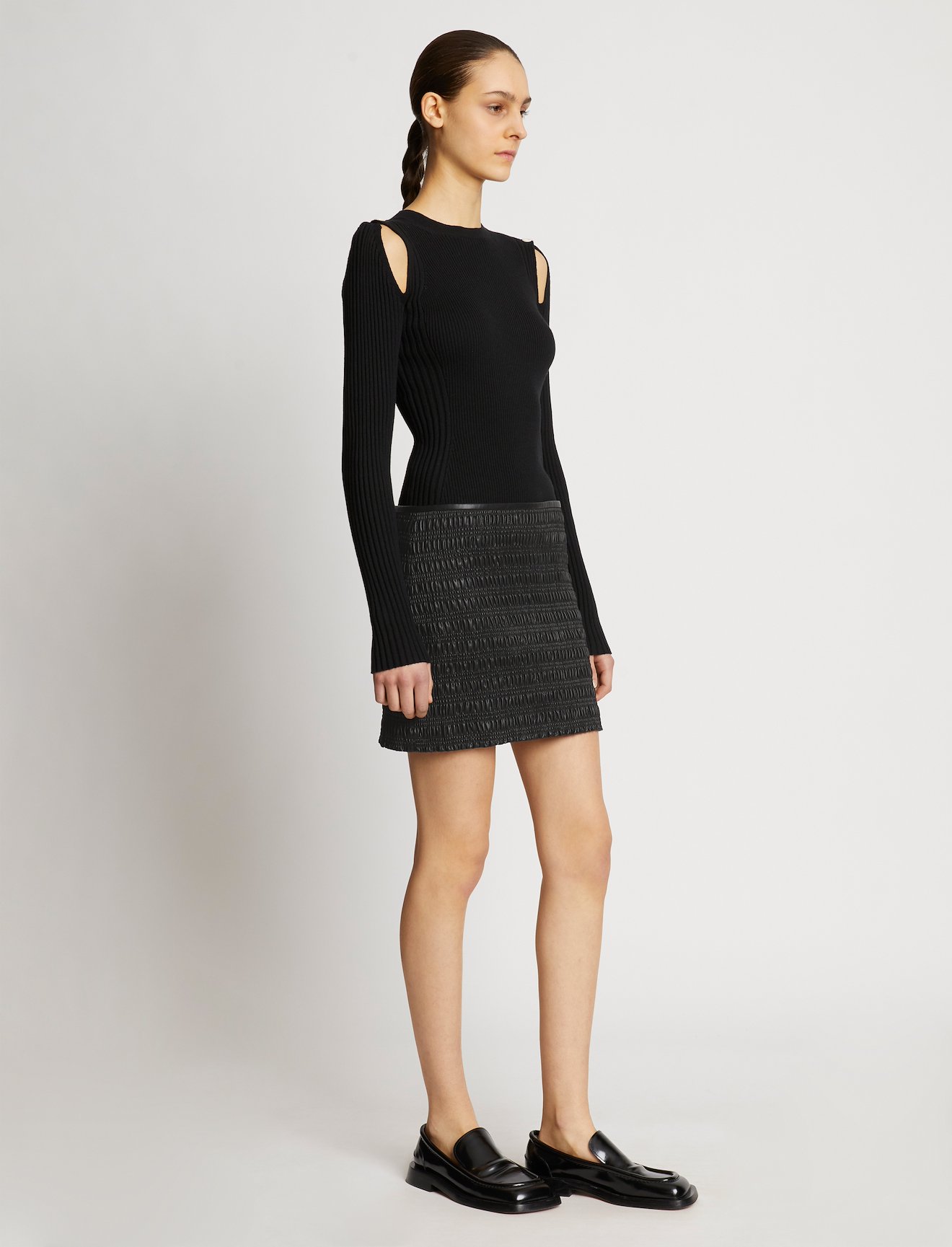 Faux Leather Smocked Mini Skirt in black | Proenza Schouler