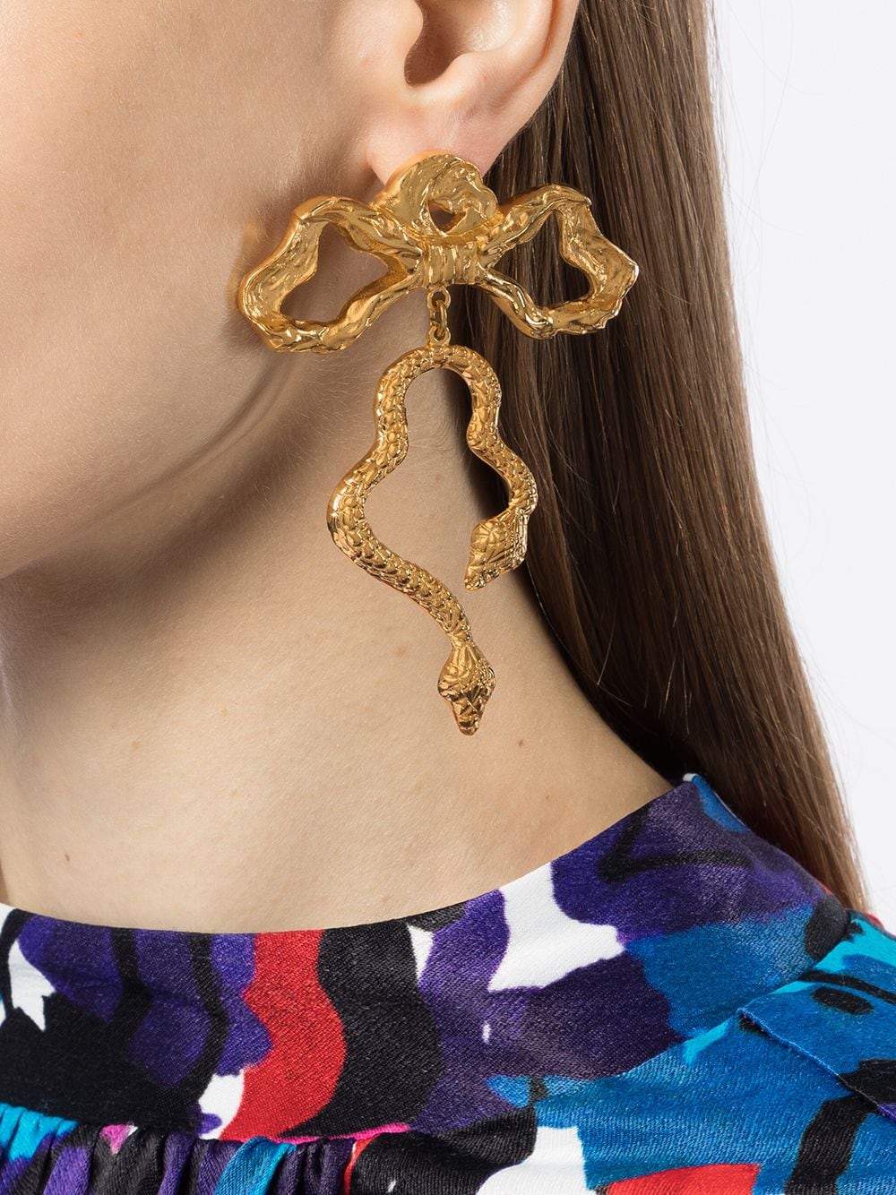 Shop Natia X Lako Long Bow Brass Earrings In Gold