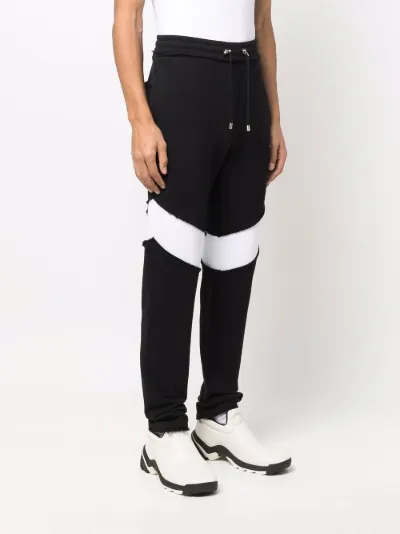 Balmain monogram-patch cotton joggers black | MODES