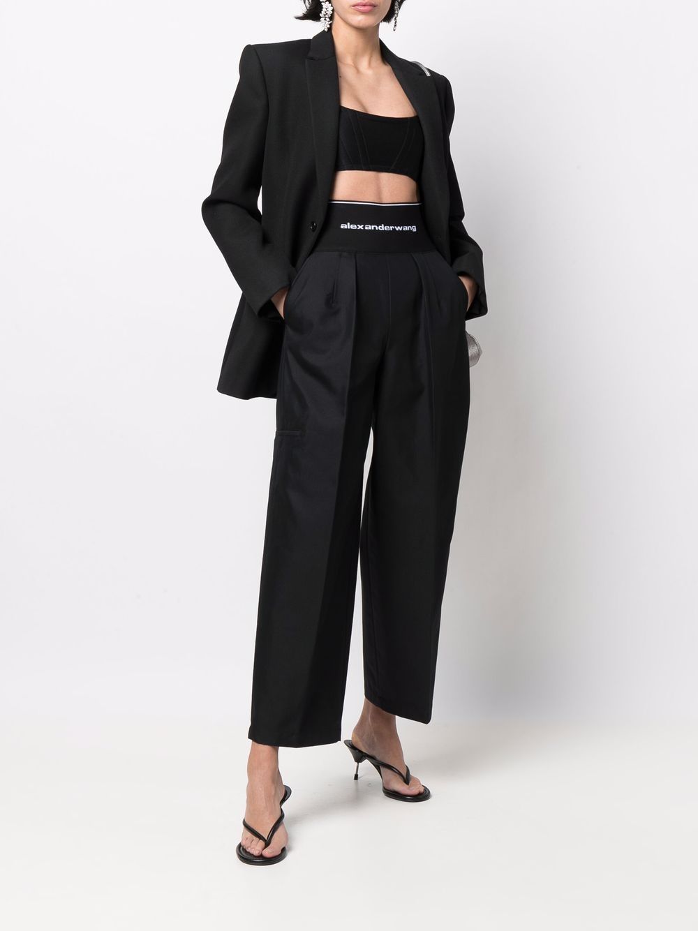 Alexander Wang logo-waist pressed-crease Trousers - Farfetch