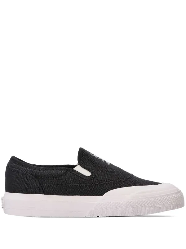 Adidas nizza slip on white best sale