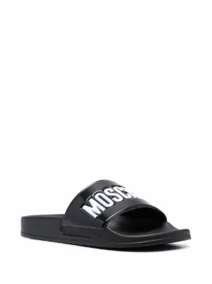 https://www.farfetch.com/uk/shopping/women/moschino/flip-flops-slides-1/items.aspx