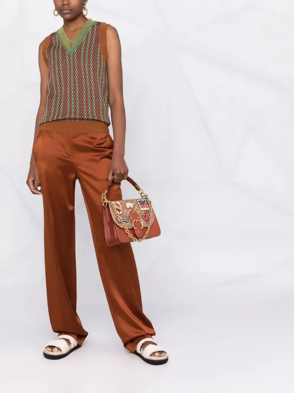 beat shoulder bolsa in signature canvas with souvenir patches