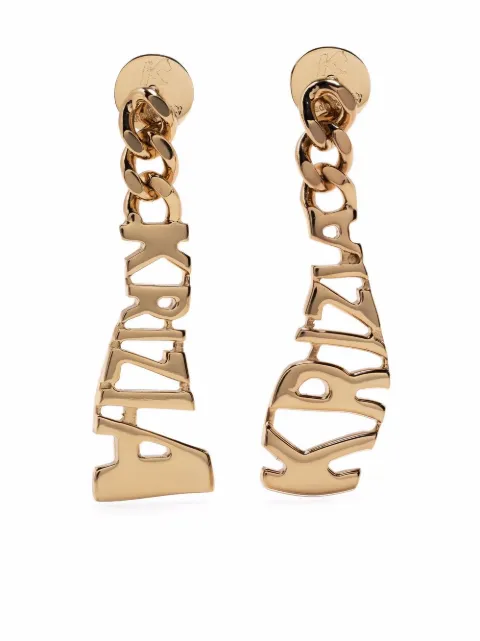 Krizia aretes con logo y apliques 