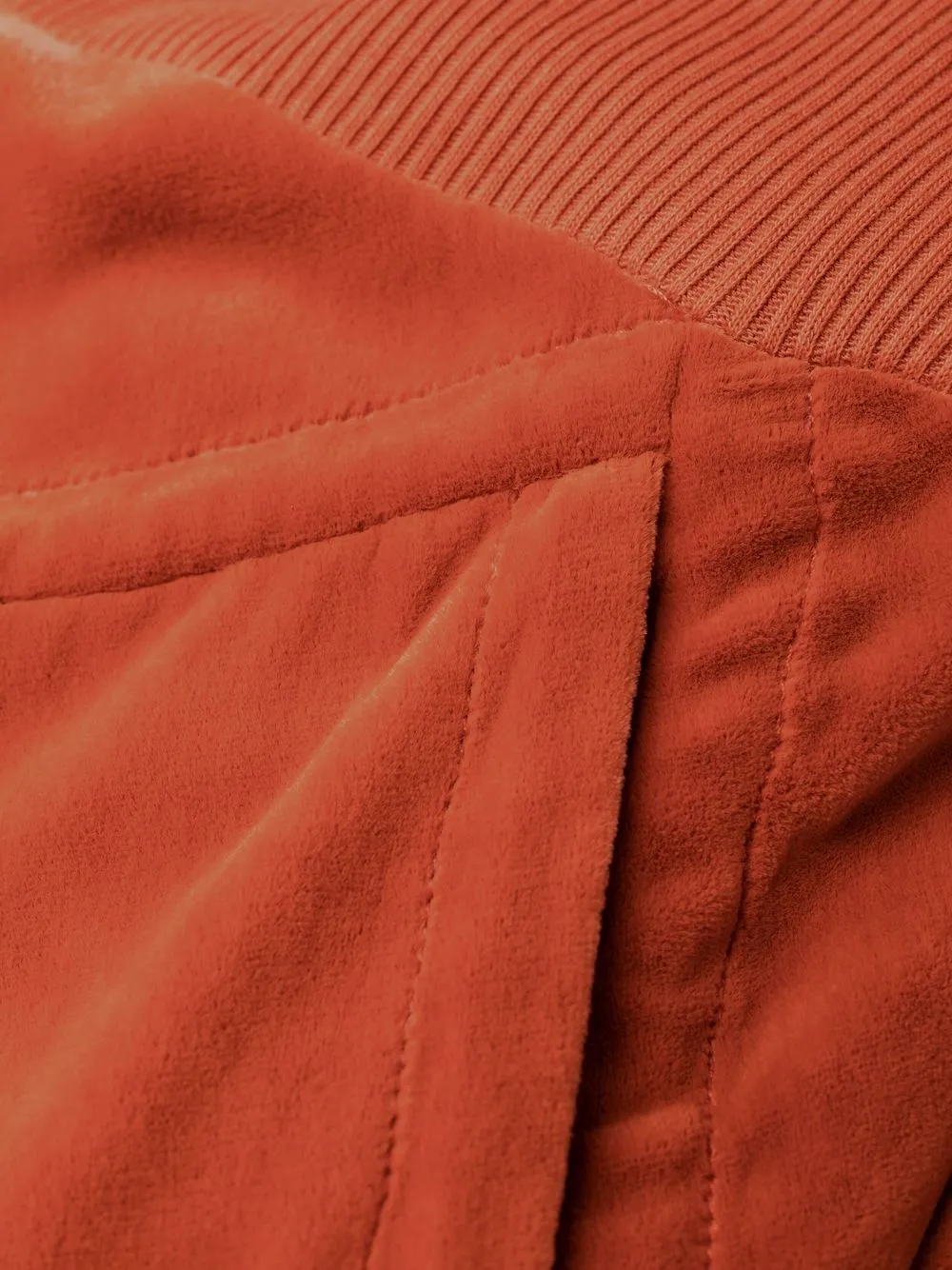 bias-cut velvet-effect trousers