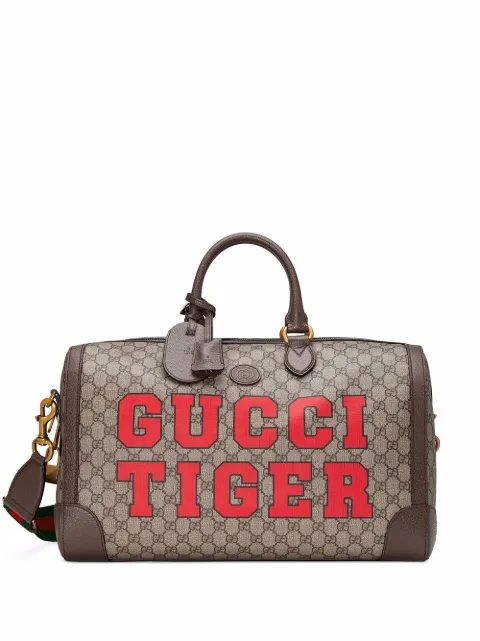 Gucci small Gucci Tiger GG supreme duffle bag