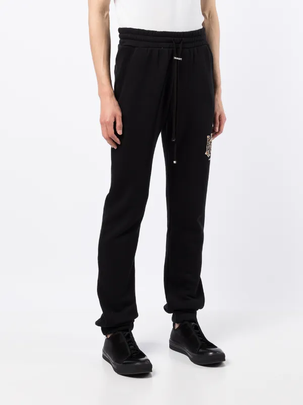 AMIRI Ma Chinese New Year Track Pants | Black | FARFETCH