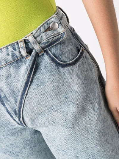 strap-detail acid wash straight-leg 