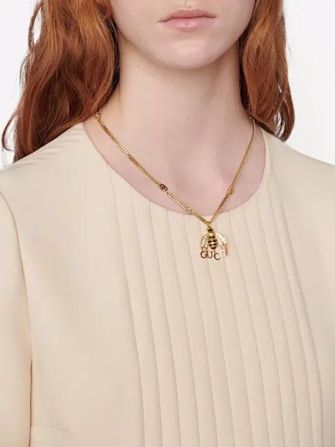 Shop Gucci logo bee necklace with 