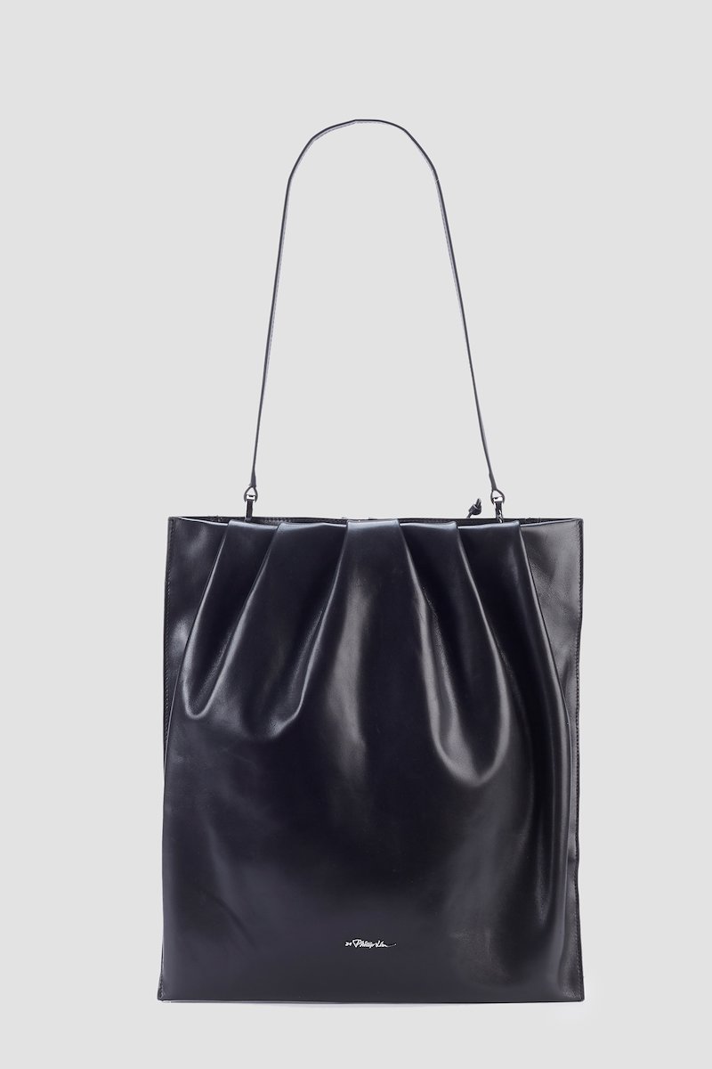 North South Blossom Bag-black #0 North South Blossom Bag, Black calf leather North South Blossom shoulder bag from 3.1 PHILLIP LIM featuring silver-tone logo lettering, detachable shoulder strap, main compartment, pleat detailing and magnetic fastening.- 0