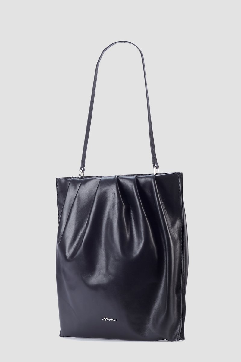North South Blossom Bag-black #1 North South Blossom Bag, Black calf leather North South Blossom shoulder bag from 3.1 PHILLIP LIM featuring silver-tone logo lettering, detachable shoulder strap, main compartment, pleat detailing and magnetic fastening.- 1