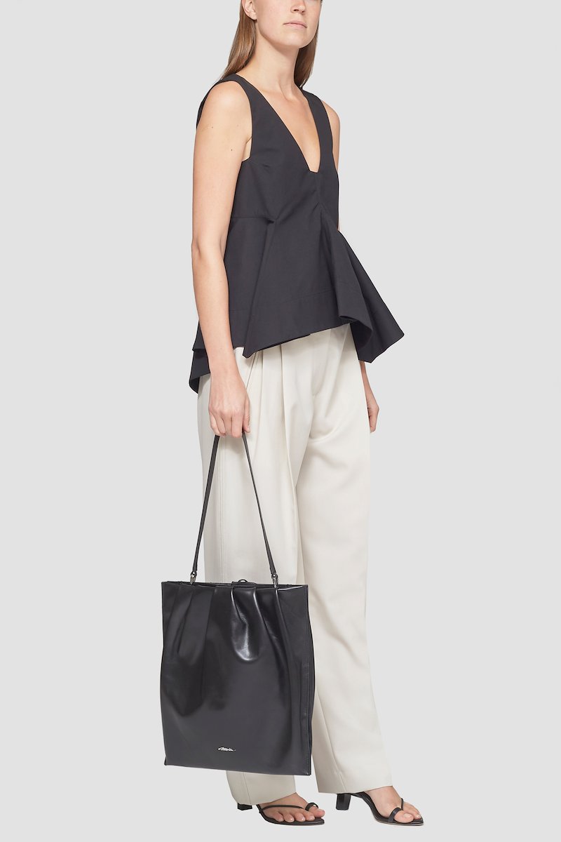 North South Blossom Bag-black #1 North South Blossom Bag, Black calf leather North South Blossom shoulder bag from 3.1 PHILLIP LIM featuring silver-tone logo lettering, detachable shoulder strap, main compartment, pleat detailing and magnetic fastening.- 5