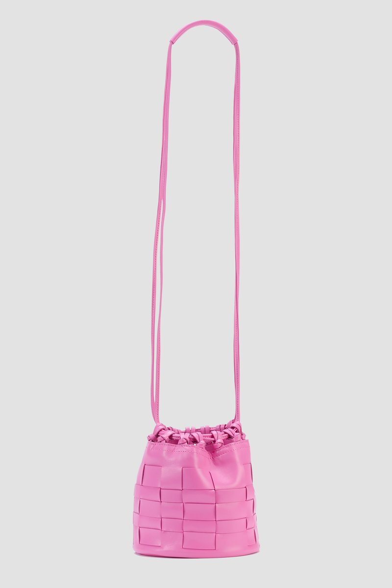 Mini Odita Pouch, Pink calf leather mini Odita bucket bag from 3.1 PHILLIP LIM featuring two rounded top handles, adjustable detachable shoulder strap, magnetic fastening, main compartment, logo stamp to the front, removable pouch, leather tag and interwoven design.- 4