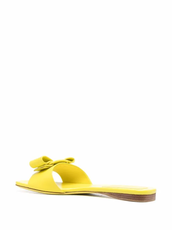 yellow bow flip flops