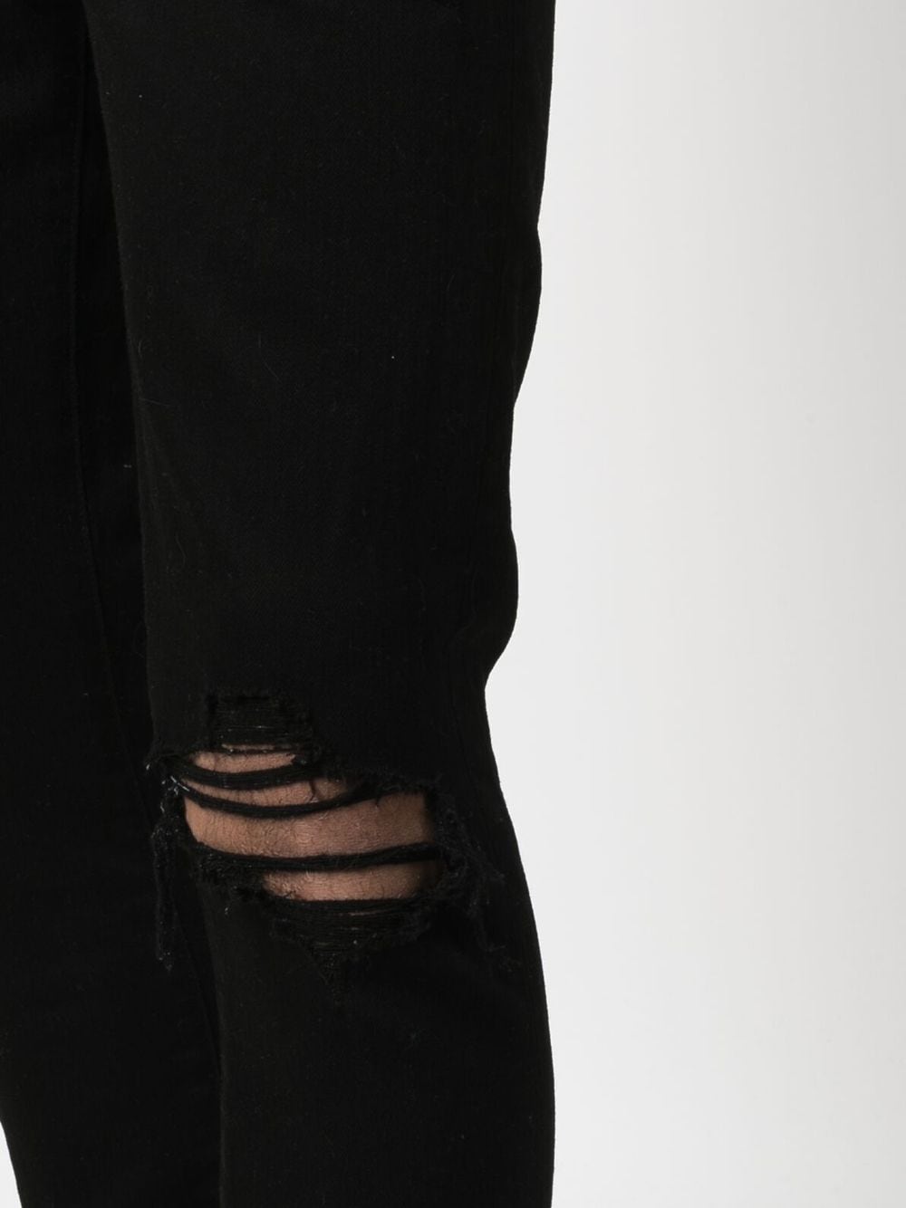 Shop Amiri Distressed-finish Slim-cut Jeans In Black