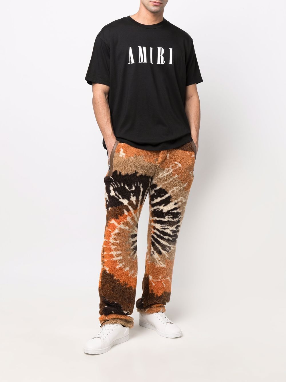 AMIRI Broek met tie-dye print - Oranje