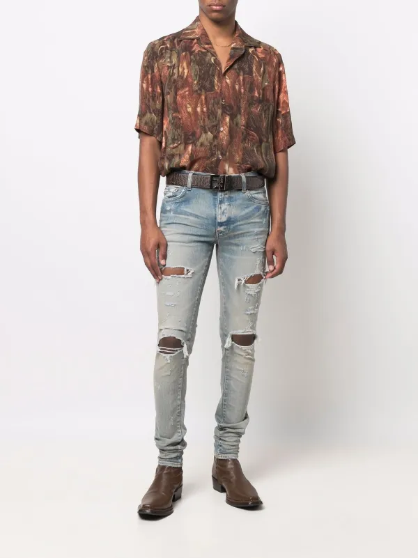 AMIRI Distressed Skinny Jeans - Farfetch