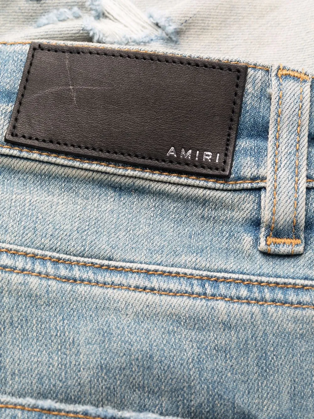 AMIRI Distressed Skinny Jeans | Blue | FARFETCH CA