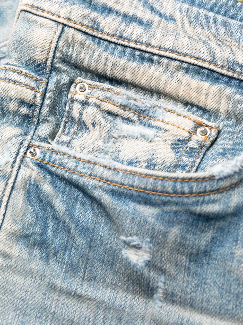 AMIRI Distressed Skinny Jeans | Blue | FARFETCH CA