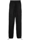 Ports V all-over logo print trousers - Black