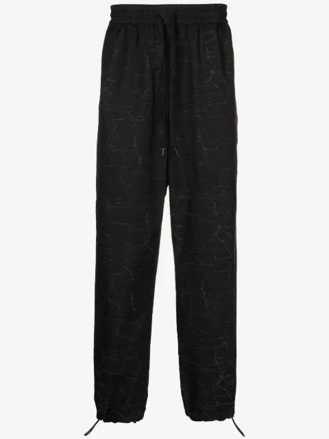 Ports V all-over logo print trousers