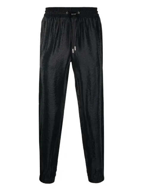 Saint Laurent pantalones tapered con rayas laterales