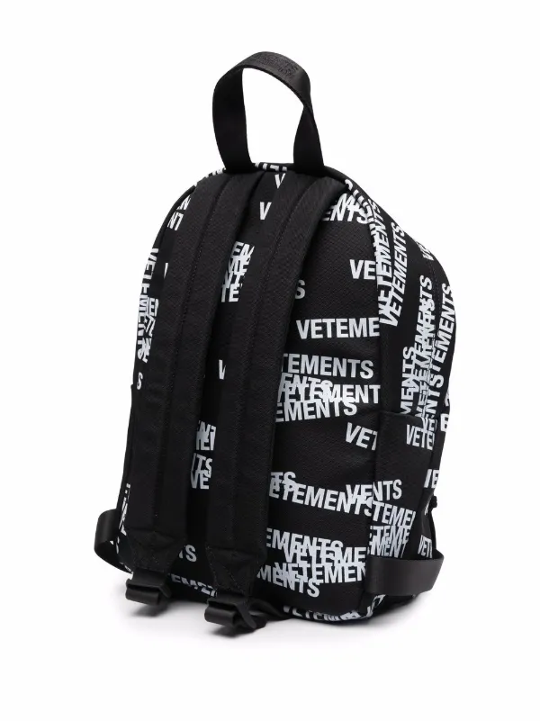 VETEMENTS logo-print Backpack | Black | FARFETCH