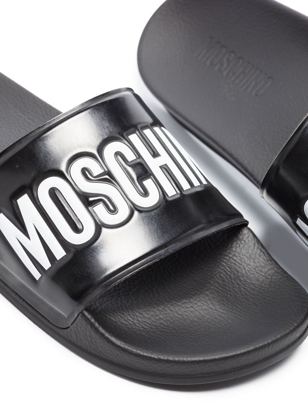 Moschino debossed-logo Pool Slides - Farfetch