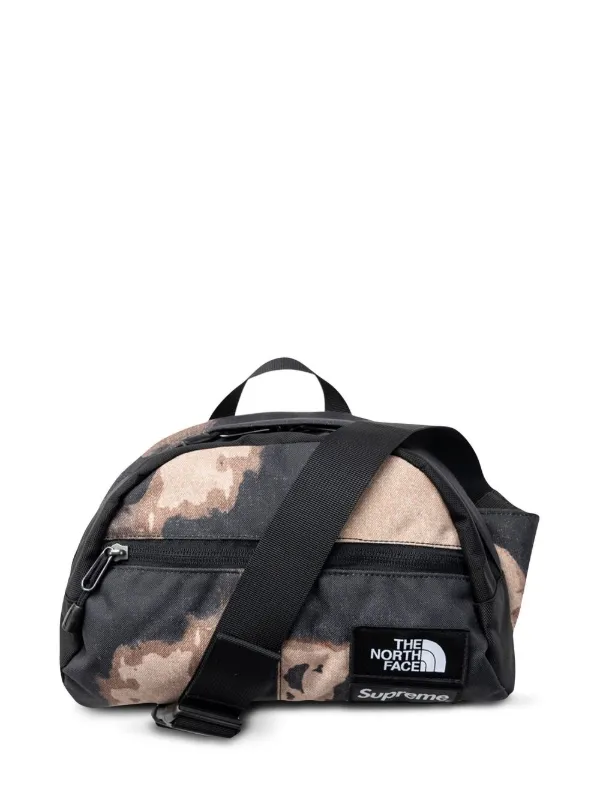 Supreme x The North Face Roo II Bleached denim-print Bag - Farfetch