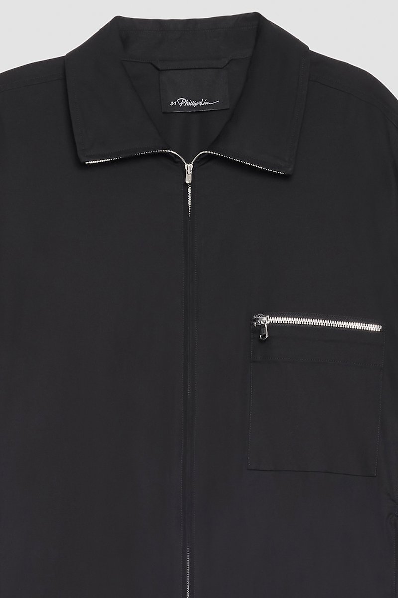 Blouson Shirt Jacket-black #0 Blouson Shirt Jacket, curve-zip windbreaker from 3.1 PHILLIP LIM featuring black, cotton blend, zip details, high neck, front zip fastening, long sleeves, zip-fastening chest pocket, two side zip-fastening pockets and elasticated hem.- 10