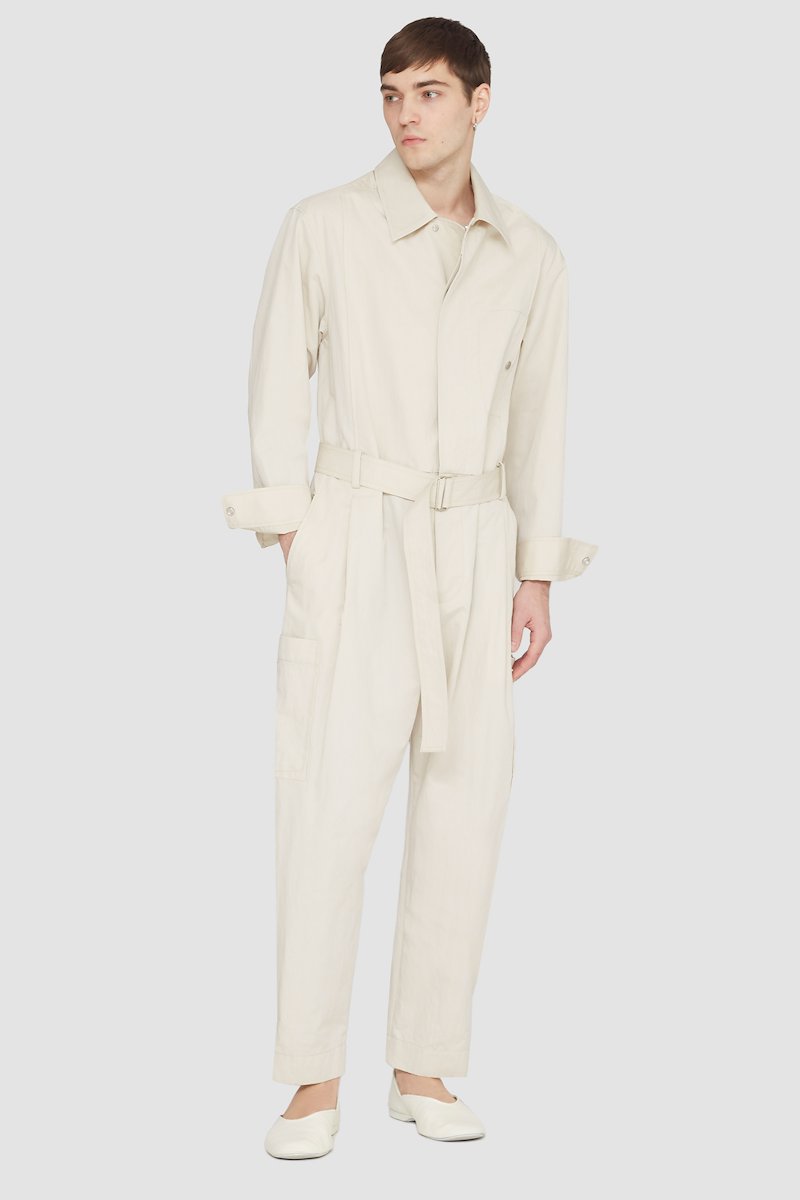 Relaxed Jumpsuit-neutrals #0 Relaxed Jumpsuit, long-sleeve jumpsuit from 3.1 PHILLIP LIM featuring sand beige, cotton blend, concealed front fastening, button-fastening chest pocket, belted waist, two side slit pockets, two side patch pockets, straight leg, classic collar and long sleeves.- 0