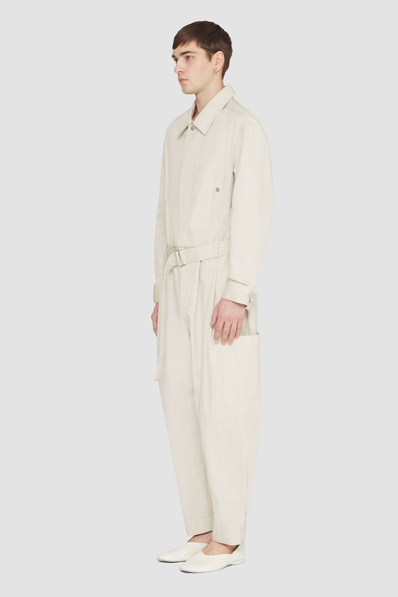 Relaxed Jumpsuit-neutrals #0 Relaxed Jumpsuit, long-sleeve jumpsuit from 3.1 PHILLIP LIM featuring sand beige, cotton blend, concealed front fastening, button-fastening chest pocket, belted waist, two side slit pockets, two side patch pockets, straight leg, classic collar and long sleeves.- 2