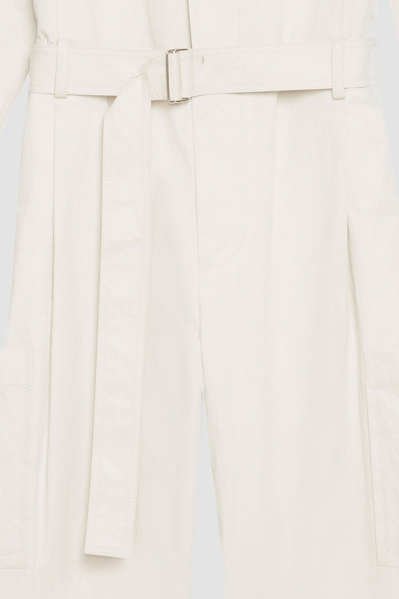 Relaxed Jumpsuit-neutrals #1 Relaxed Jumpsuit, long-sleeve jumpsuit from 3.1 PHILLIP LIM featuring sand beige, cotton blend, concealed front fastening, button-fastening chest pocket, belted waist, two side slit pockets, two side patch pockets, straight leg, classic collar and long sleeves.- 7