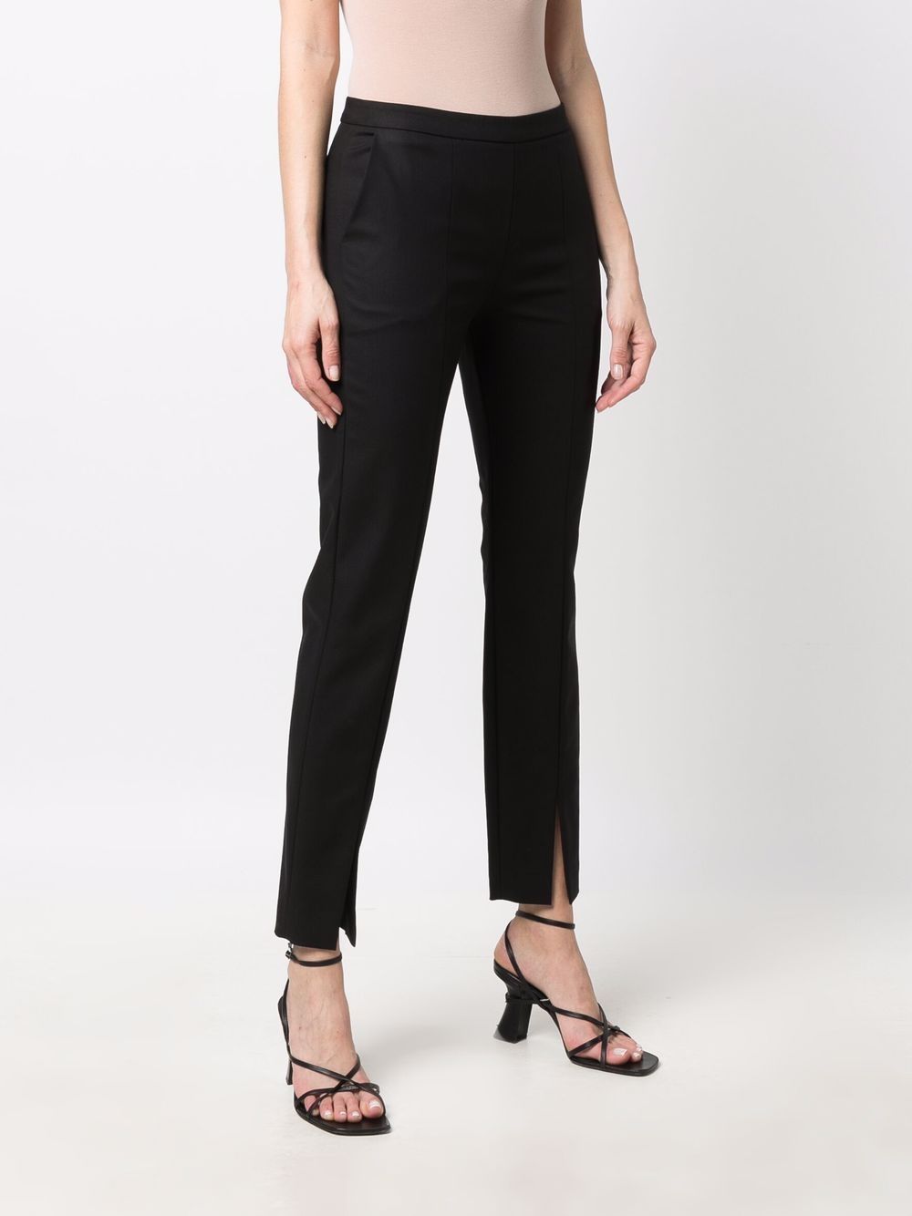 фото Genny slit-detail tailored trousers