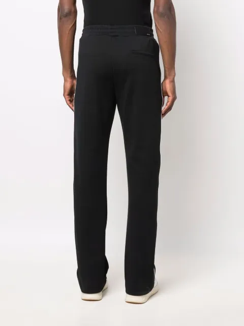 Shop AMIRI drawstring tracksuit bottoms with Express Delivery - FARFETCH