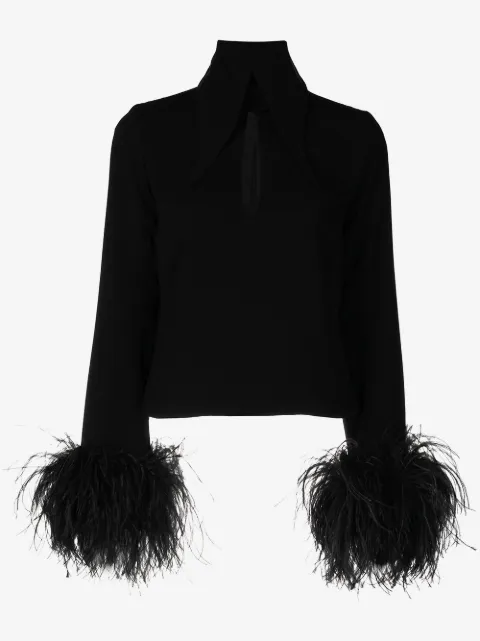 16Arlington blusa con ribete de plumas