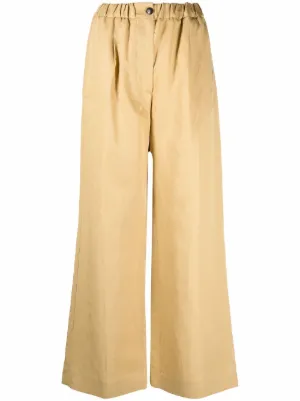Pantalones acampanados Tela para mujer - FARFETCH