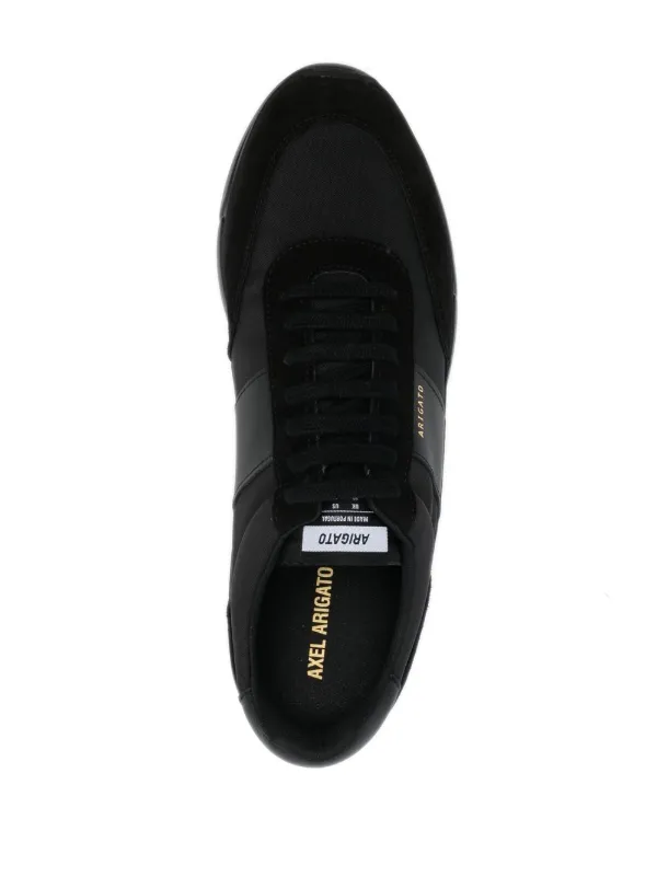 black axel arigato trainers