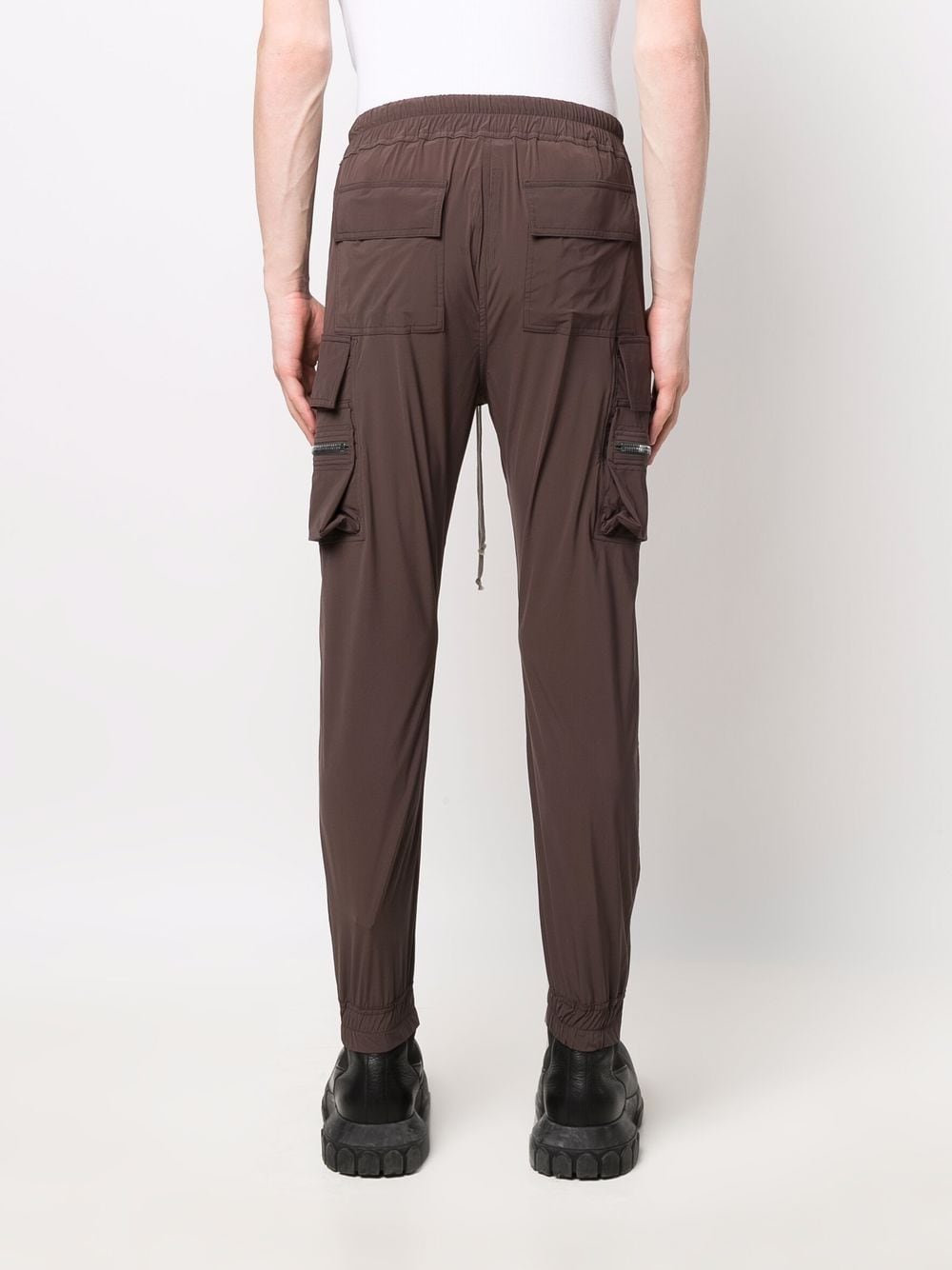 Shop Rick Owens drawstring-waist multiple-pocket trousers with Express ...
