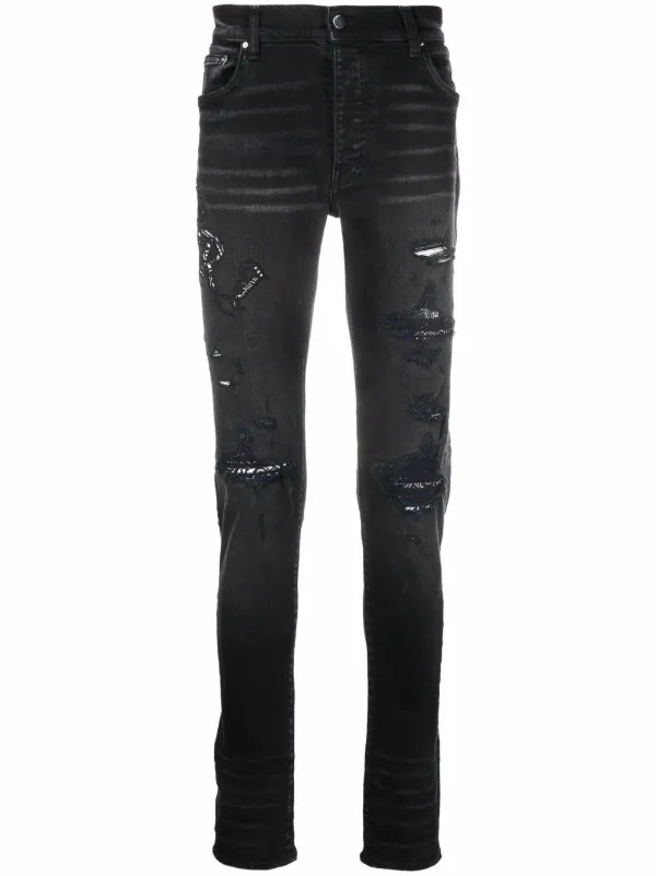 AMIRI embroidered-logo skinny jeans 