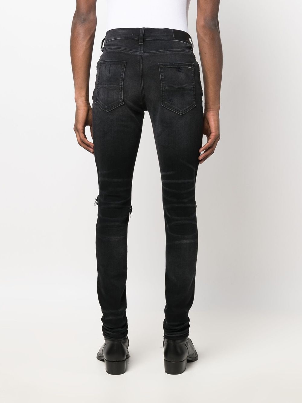 AMIRI mid-rise Distressed Skinny Jeans - Farfetch