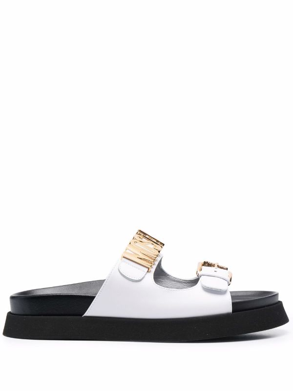 Moschino logo plaque discount leather thong sandals