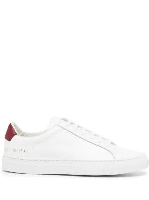 woman by common projects slip on